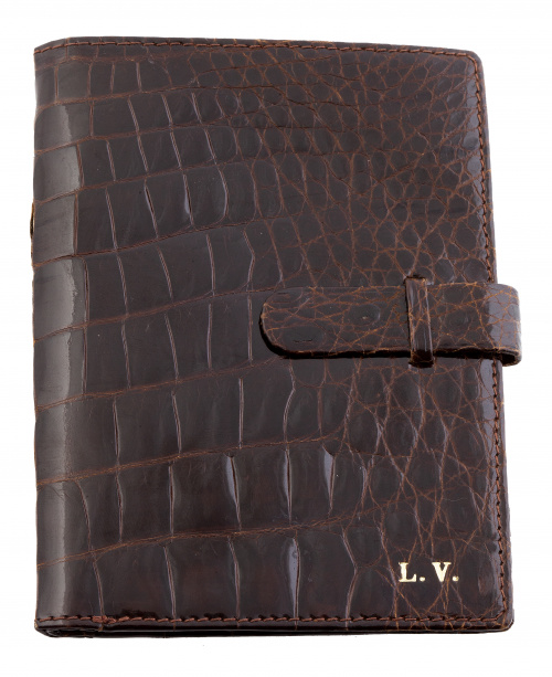Cartera en piel de cocodrilo con iniciales estampadas en oro