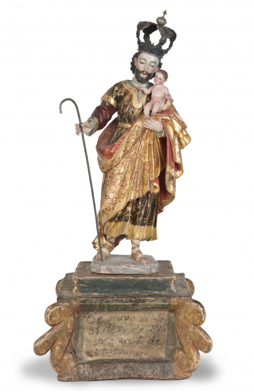 San José con el Niño.Escultura en madera tallada, policro