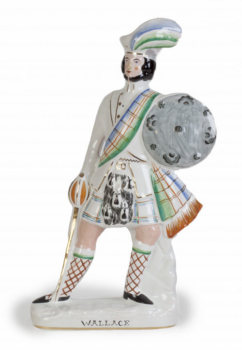 “Escocés con espada y escudo”.Figura de loza esmaltada.