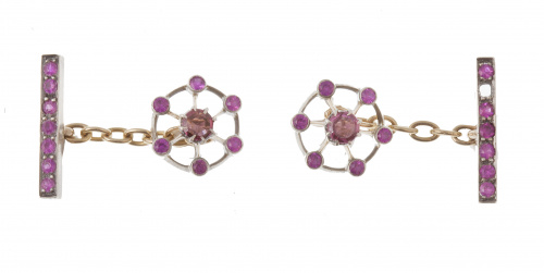 Gemelos pp. S. XX con diseño de círculo a modo de timón y b