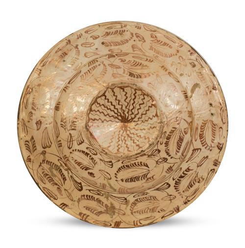 Plato heráldico con un dragón de cerámica esmaltada de refl