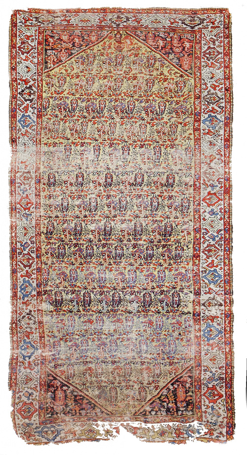 Alfombra de campo rojo con decoración vegetal, Persia.