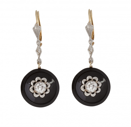 Pendientes de pp. S. XX con flores de diamantes con centro 