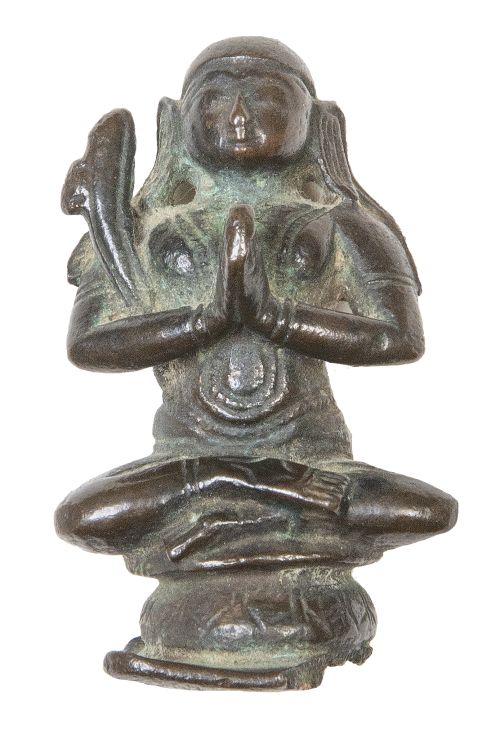 Antigua deidad india de metal.