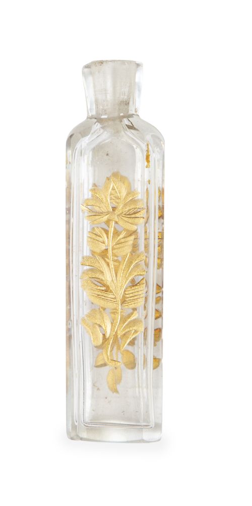 Perfumero de vidrio transparente con decoración de flores e