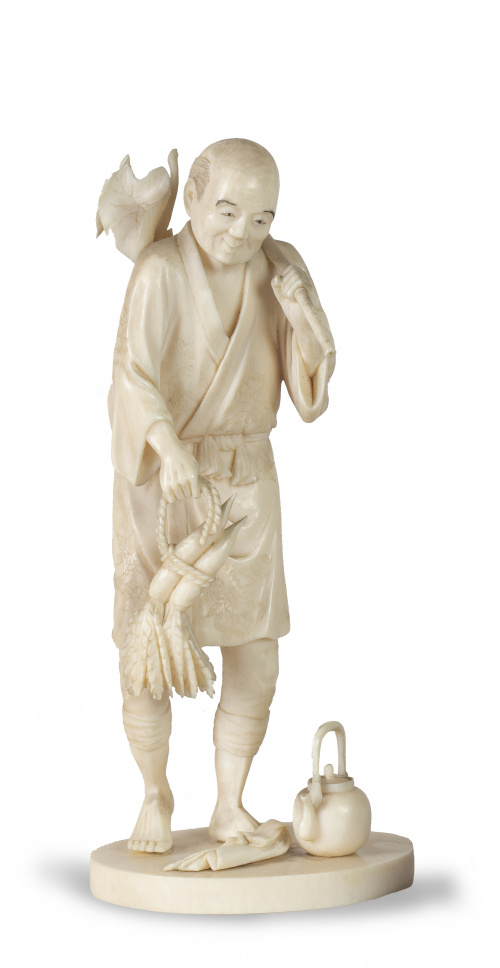 Okimono de marfil tallado con agricultor.Japón, periodo M