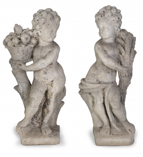 Pareja de figuras alegóricas de jardín talladas en piedra. 