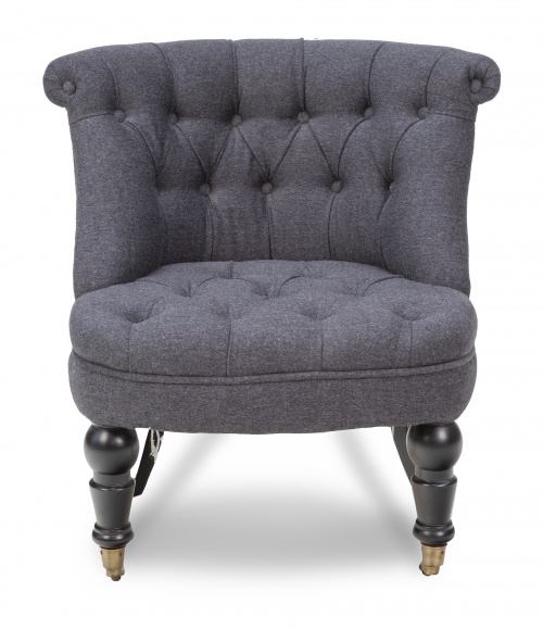 Butaca moderna con tapiceríca capitoné en gris.