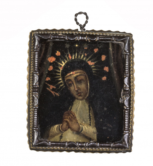 Relicario con marco de hierro con Virgen de la Paloma y Cri