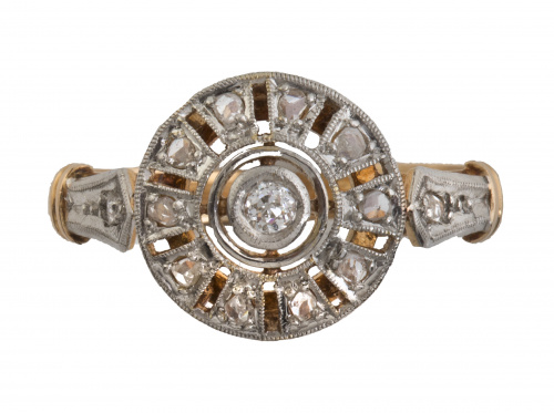 Sortija Art-Decó circular con brillante central y marco cal