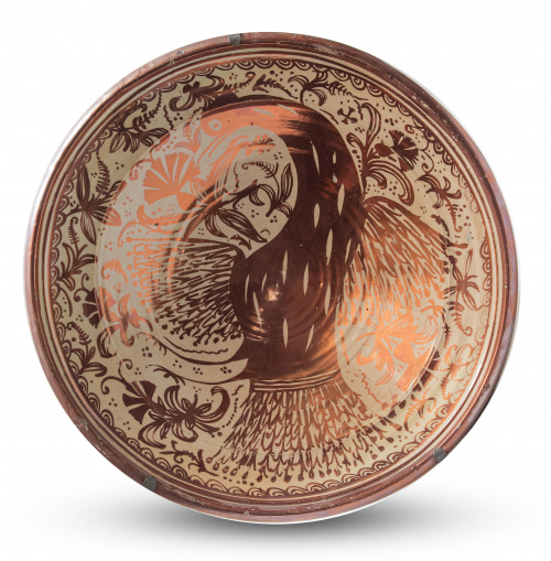 Plato acuencado de cerámica de reflejo metálico con "pardal