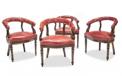 Juego de cuatro butacas eduardinas de bibilioteca, con tapi