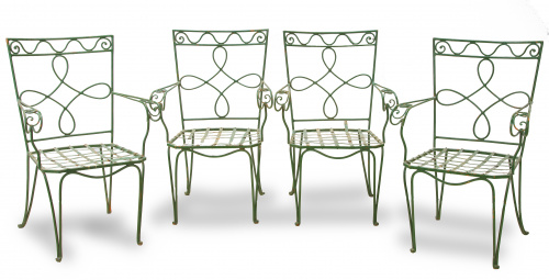 Juego de cuatro sillas de jardín en hierro pintado de verde