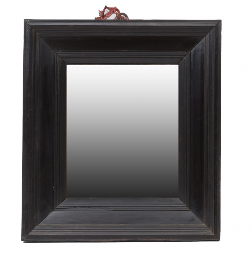 Espejo de madera ebonizada, moldurado.España, S. XVIII.