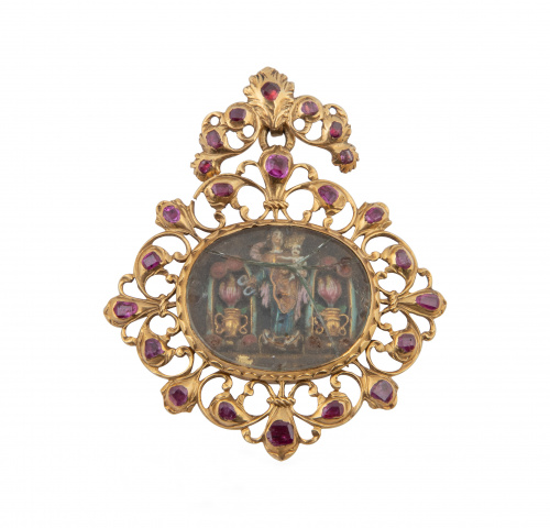 Relicario colgante S. XVII-XVIII con marco calado de rubíes