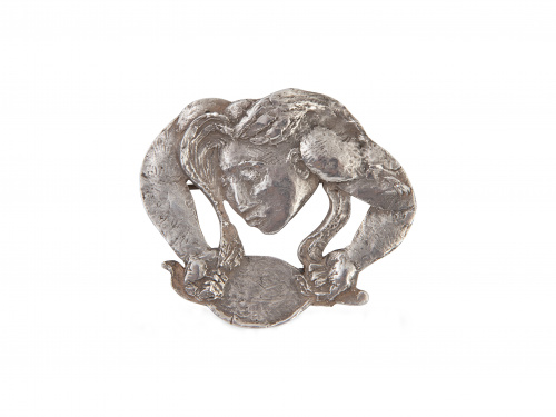Broche de plata Art-Decó con dama equilibrista