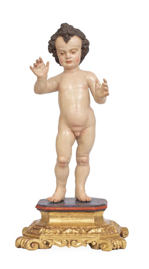 Niño Jesús triunfante.Escultura de madera tallada y polic