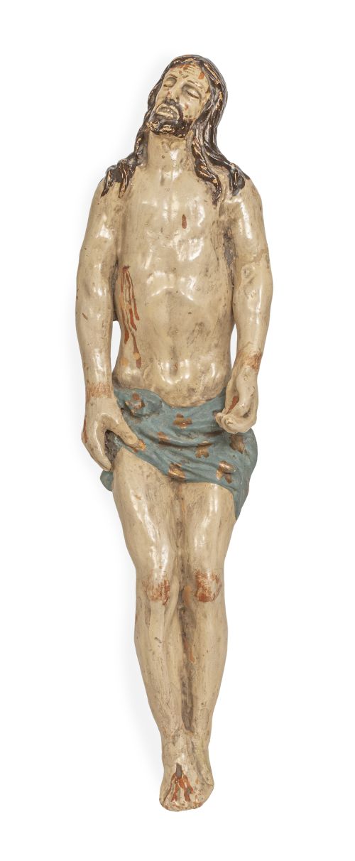 Cristo yacente en terracota policromada.En urna de crista