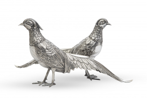 Pareja de faisanes decorativos de alpaca.S. XX.