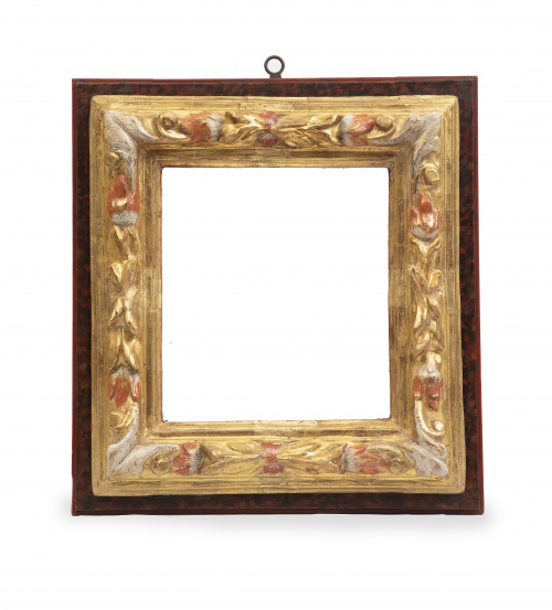 Marco en madera tallada, policromada y dorada.Trabajo esp