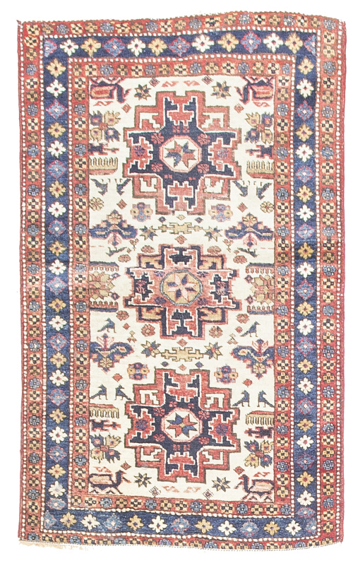 Antigua alfombra caucásica Lesgui .