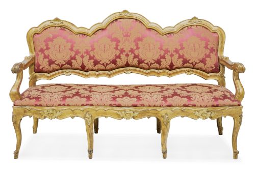 Sofá en madera tallada y dorada de estilo Luis XV.Trabajo