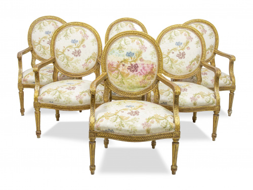 Lote de seis butacas en madera tallada y dorada, h. 1800.