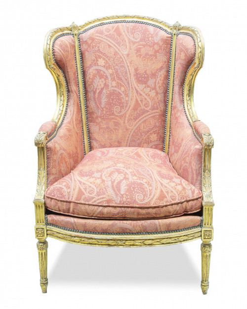 Butaca de orejas en madera tallada y dorada de estilo Luis 