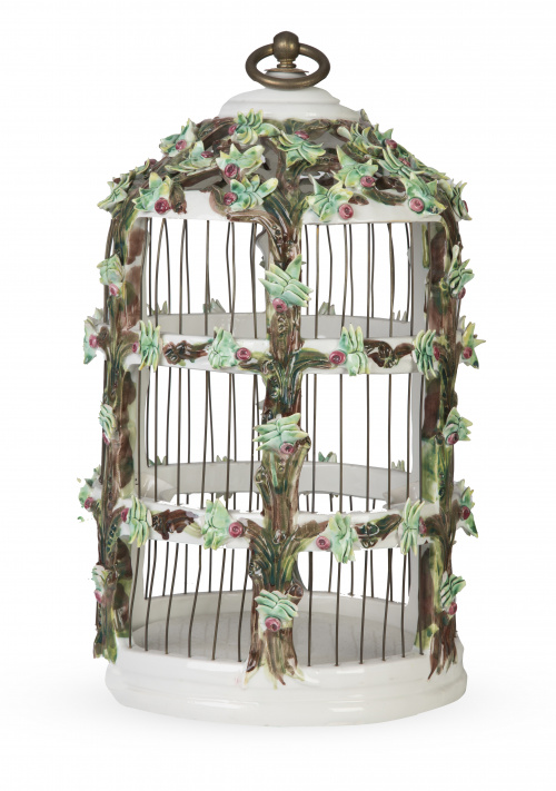 Jaula de porcelana esmaltada, simulando un tronco con hojas