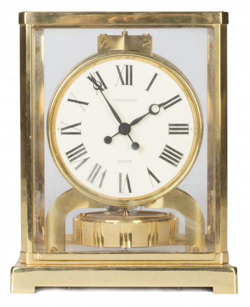 Reloj en metal dorado y cristal modelo Atmos.Jaeger Lecou