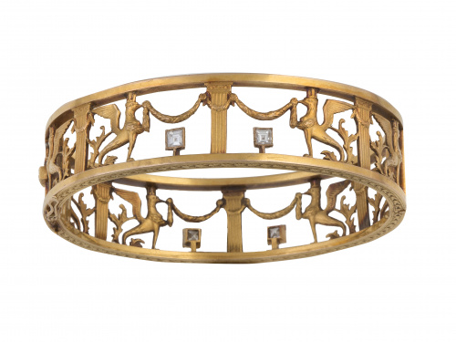 Brazalete rígido calado de pp. S. XX con diamantes carré en