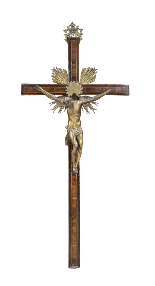 Cristo expirante.En bronce dorado, sobre cruz de madera d