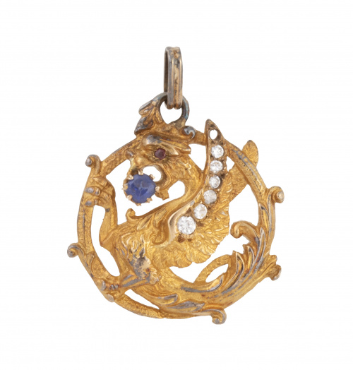 Colgante circular con figura de dragón calada con zafiro en
