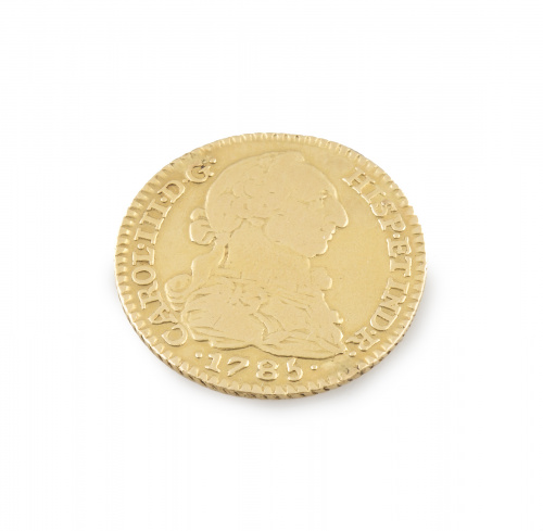 Moneda de un escudo de oro de Carlos III 1785. M. DV.