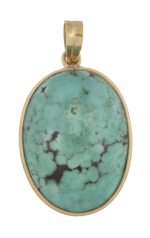 Colgante oval de turquesa sobre marco en oro amarillo de 18