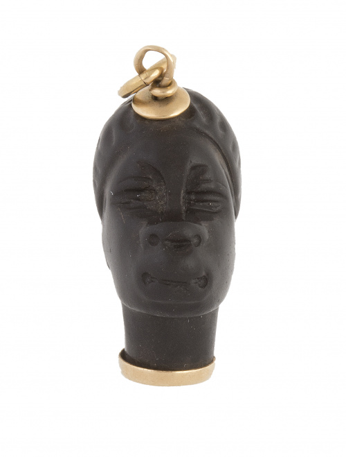 Colgante con diseño de cabeza de africano tallada en ónix