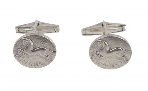 Gemelos HERMES en metal plateado con caballos en relieve en