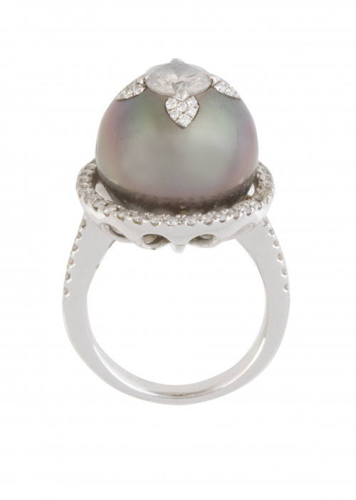 Sortija con gran perla de Tahití redonda orlada de brillant