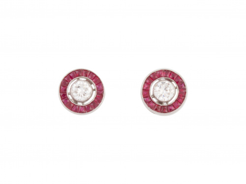 Pendientes ojo de perdiz con un brillante en chatón orlado 