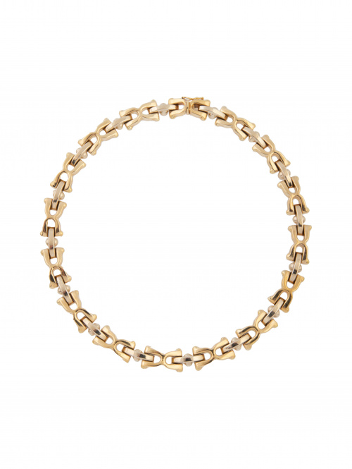 Collar articulado con piezas de doble "C" unidas por bandas