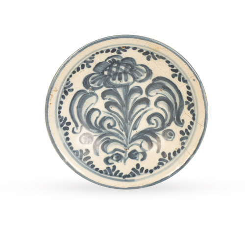 Pequeño plato acuencado de cerámica esmaltada en azul de co