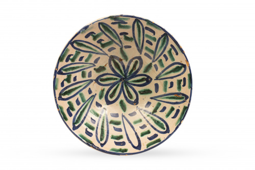 Cuenco de cerámica esmaltada en azul y verde con flor en el