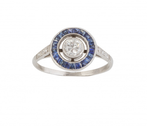 Sortija ojo de perdiz con brillante central de 0,45 ct orla