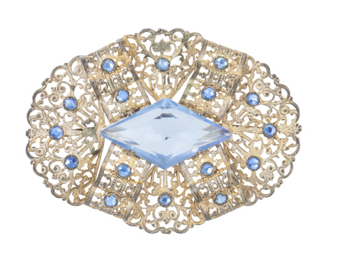 Conjunto de tres broches de bisutería de pp de S. XX en pla