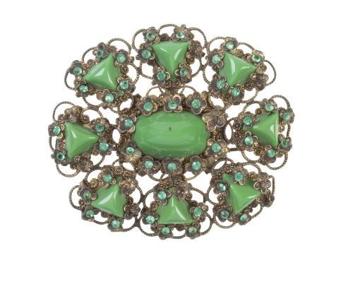 Conjunto de tres broches de bisutería de pp de S. XX en pla