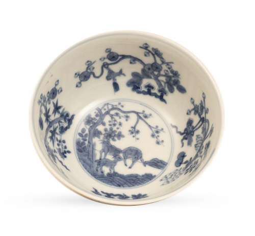 Cuenco de porcelana esmaltado en amarillo, sobre peana de m