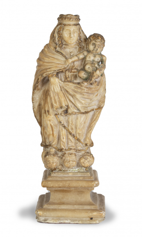 Virgen con el Niño.Escultura en alabastro tallado con res