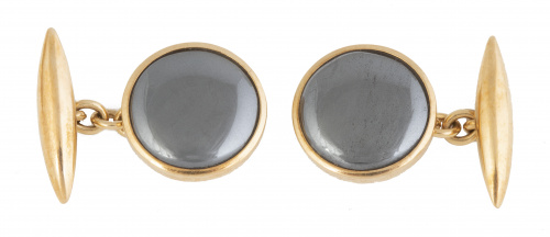 Gemelos circulares con botón de hematites con marco de oro 