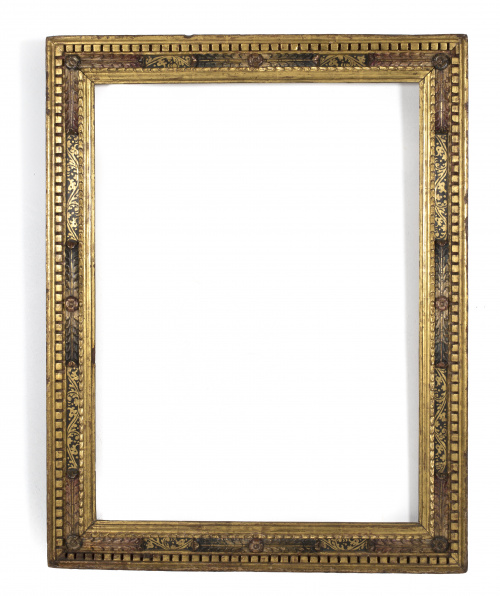 Marco denominado “Herreriano” en madera tallada, estofada, 