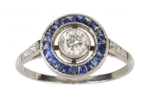 Sortija ojo de perdiz con brillante central de 0,45 ct orla